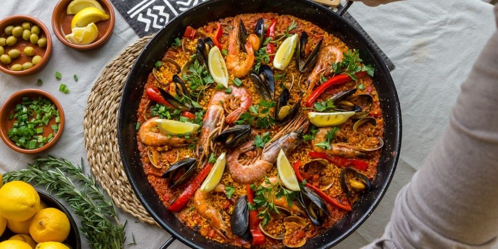 Large paella being served