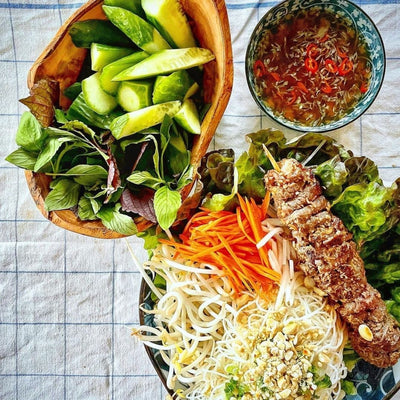 Plated Vietnamese Noodle Bowl with nuoc mam dipping sauce